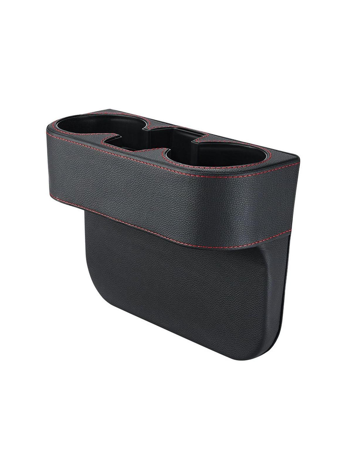 Uchwyt na kubki między fotele czarny