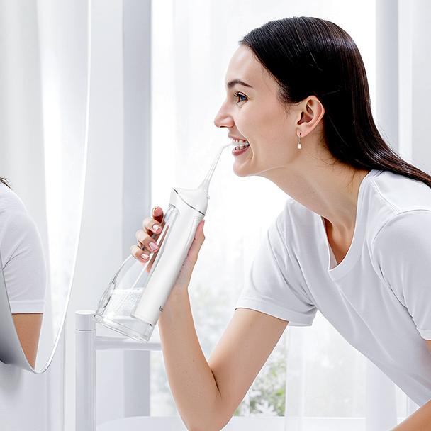 Irygator do płukania jamy ustnej Hoco IPX7 300 ml HP63 biały